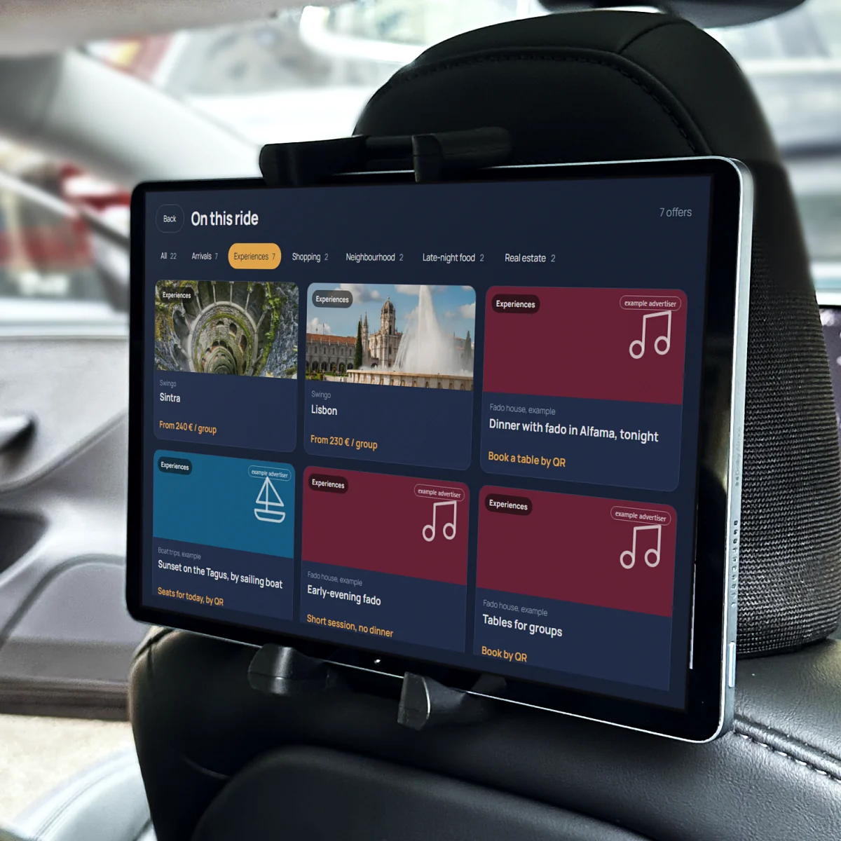 The tablet installed on the seatback of a fleet car